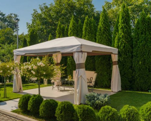 Chairs and Tables under Gazebo with White Tent